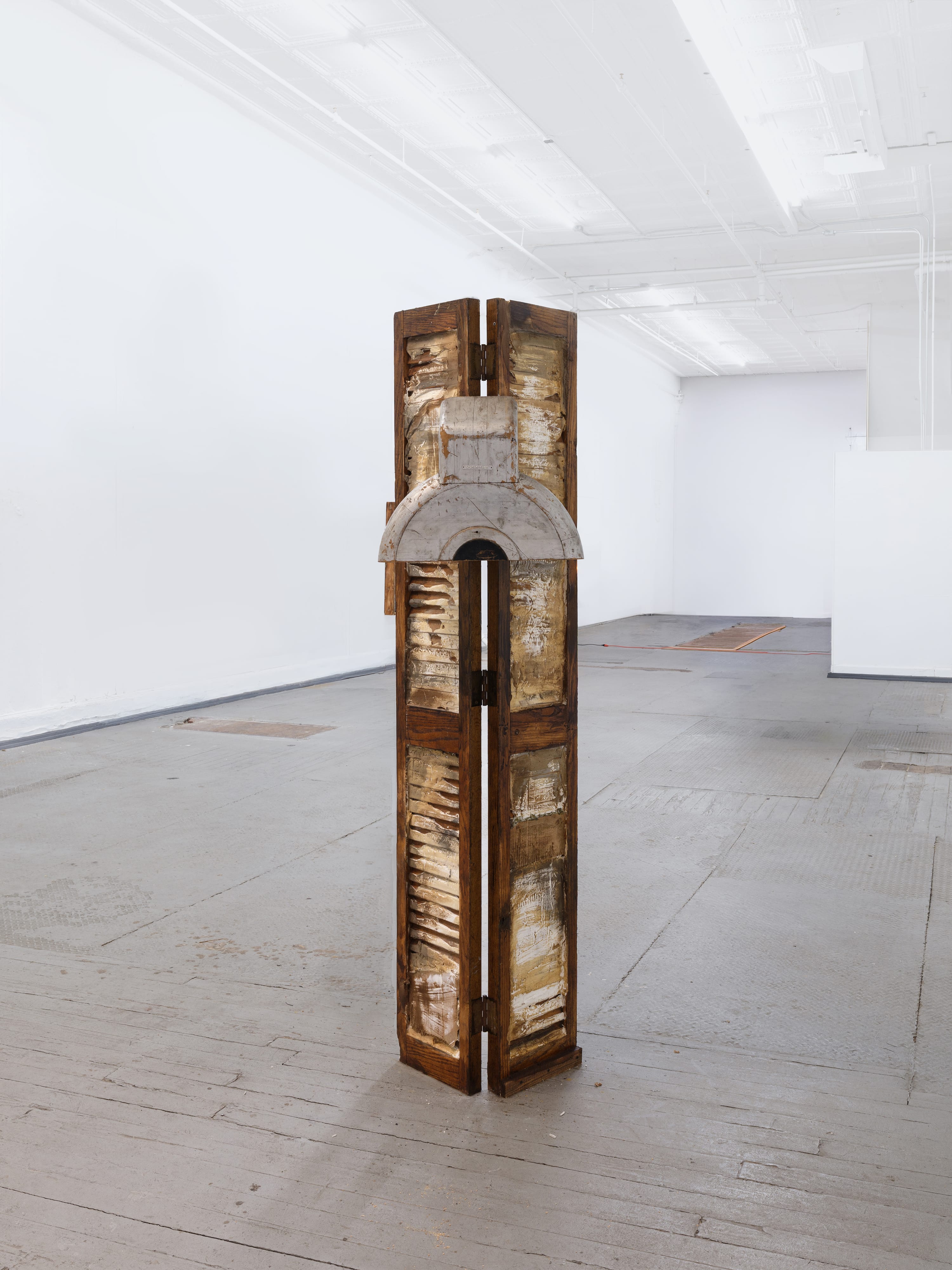Mónica Mays, <i>tool and die</i>, 2026. Found wood shutters, found wood foundry mold, gesso, stain, 80 x 20 x 16 in (203 x 51 x 41 cm)